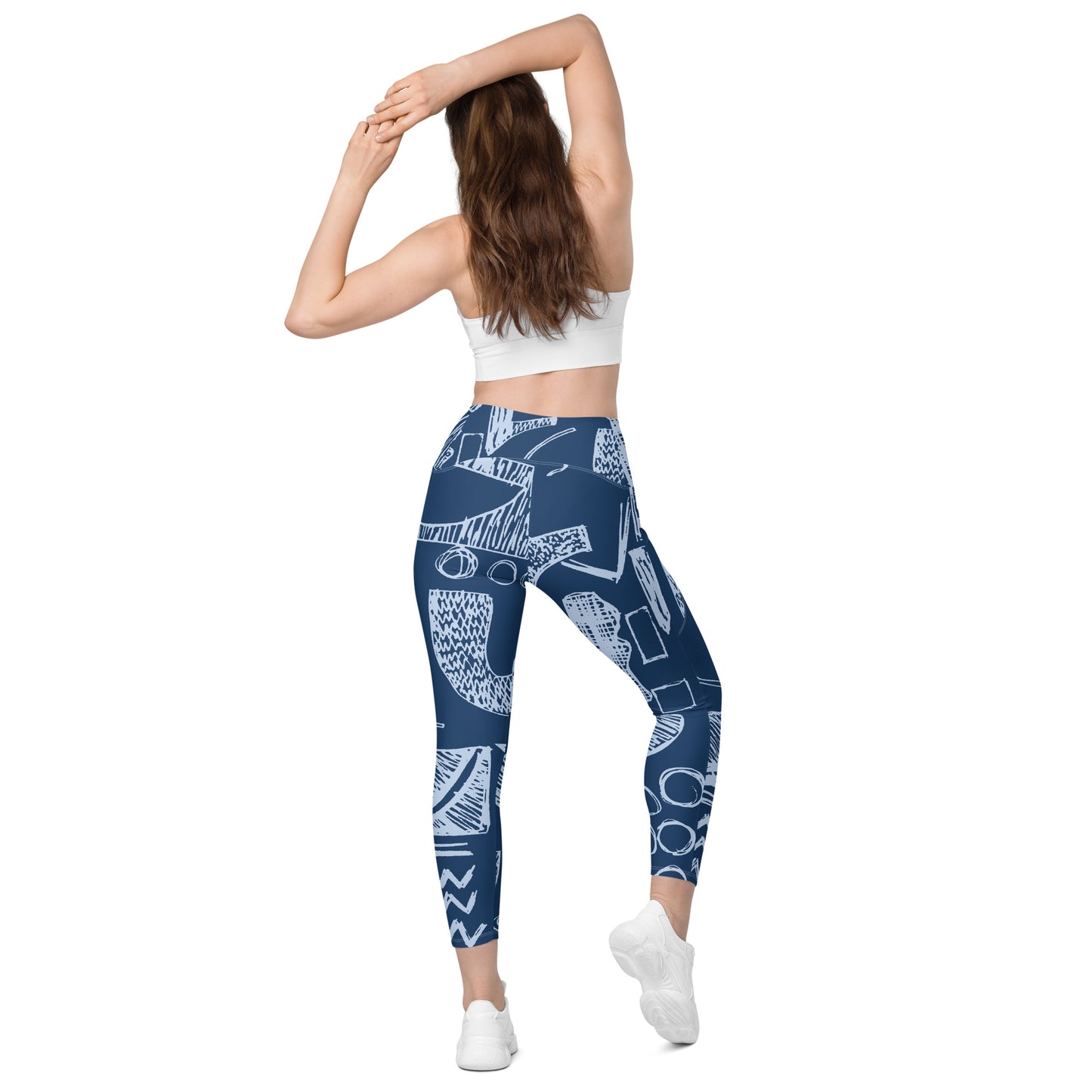 Leggings mit überkreuzter Taille und geometrischen Taschen aus recyceltem Polyester