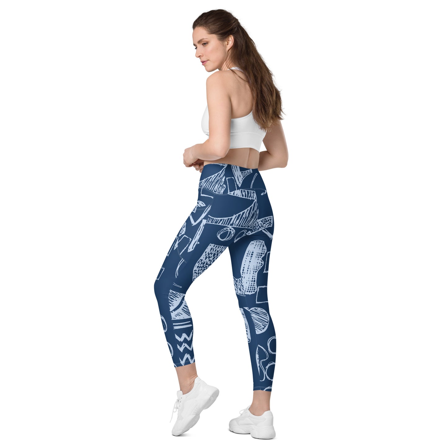 Leggings mit überkreuzter Taille und geometrischen Taschen aus recyceltem Polyester